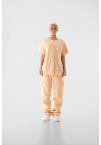 9N1M SENSE Loose fit Cargo Pants in Orange: front