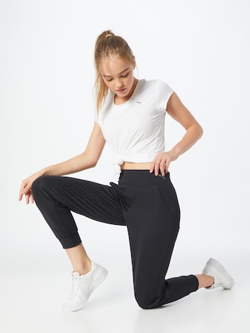 Effilé Pantalon de sport PUMA en noir