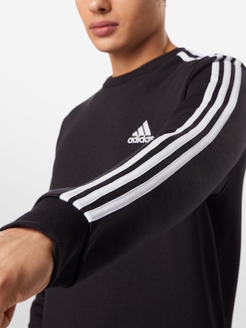 ADIDAS SPORTSWEAR Sportsweatshirt 'Essentials French Terry 3-Stripes' in Schwarz