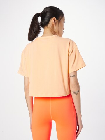 Champion Authentic Athletic Apparel Λειτουργικό μπλουζάκι σε πορτοκαλί
