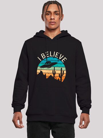 F4NT4STIC Sweatshirt 'I Believe UFO Alien Sonnenuntergang' in Zwart: voorkant
