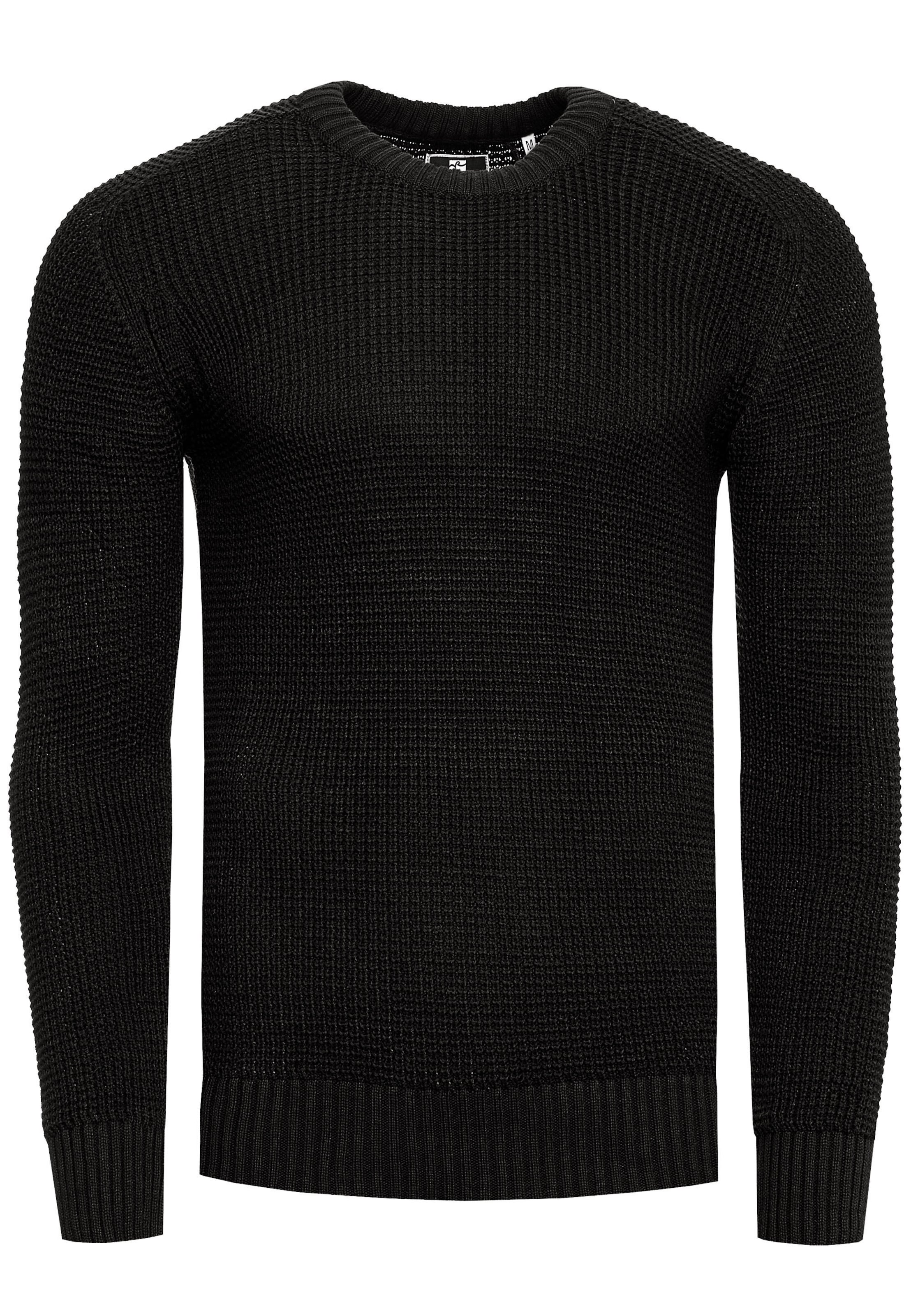 Rusty Neal Pullover in Schwarz: Vorderseite
