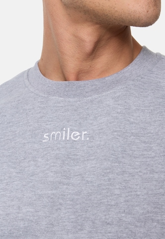 Sweat-shirt smiler. en gris
