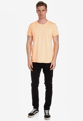 Rusty Neal T-Shirt in Orange