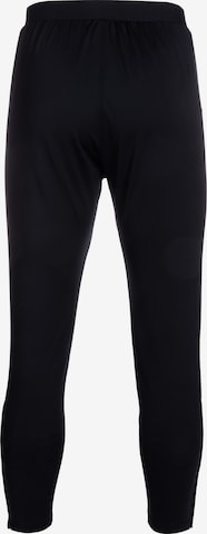 Tapered Pantaloni sportivi di JAKO in nero