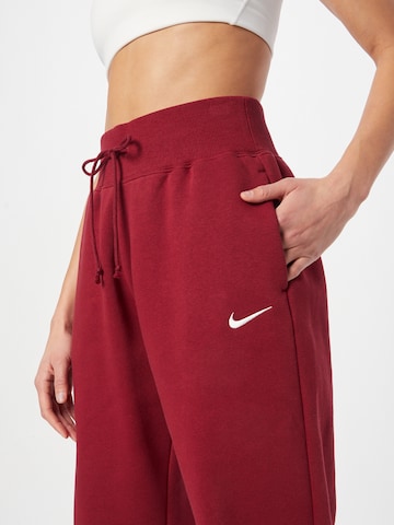 Nike Sportswear Tapered Nadrág 'Phoenix Fleece' - piros