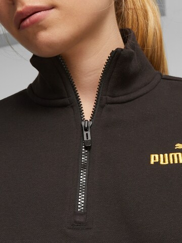PUMA Bluzka sportowa 'ESS+ MINIMAL' w kolorze czarny