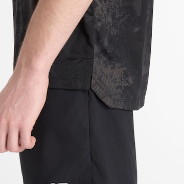 T-Shirt fonctionnel 'Athletics' new balance en noir