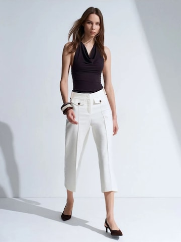 Wide leg Pantaloni di Dilvin in bianco