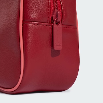 ADIDAS ORIGINALS - Mala de ombro 'Adicolor Elongated' em vermelho
