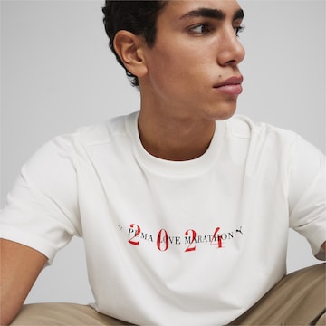 T-Shirt fonctionnel 'Love Marathon Grafik' PUMA en blanc