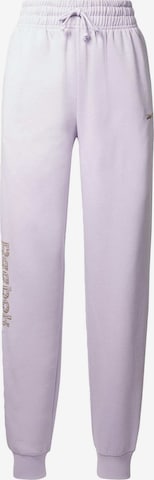 Effilé Pantalon de sport Reebok en violet : devant