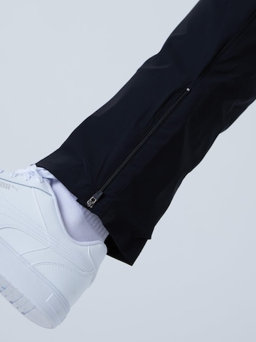 SPORTKIND Regular Sportbroek in Zwart