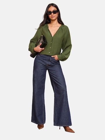 Friends Like These Blus i grön: framsida