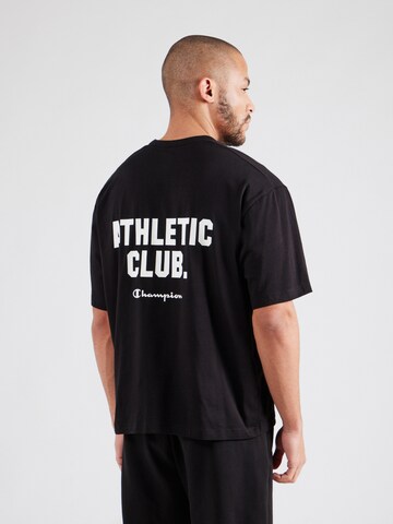 Champion Authentic Athletic Apparel - Camiseta funcional en negro: frente