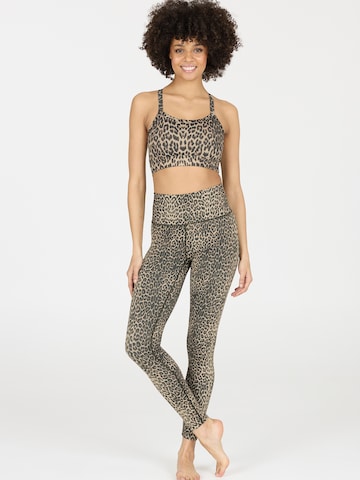 Skinny Pantaloni sportivi 'Windia' di Athlecia in beige