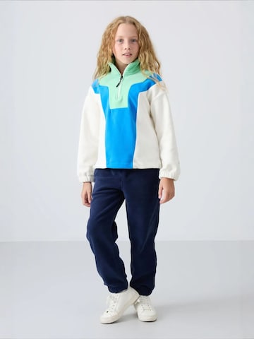 Sweat-shirt 'TOMMY Unisex Jugend-Oversize Color-Blocked Sweatshirt' Tommy Life en mélange de couleurs