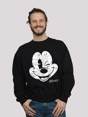 F4NT4STIC Sweatshirt 'Disney Mickey Mouse Since Beaten Face Char Cadt' in Zwart: voorkant