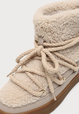 Après-ski 'CURLY' INUIKII en beige