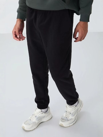 Tapered Pantaloni di Tommy Life in nero
