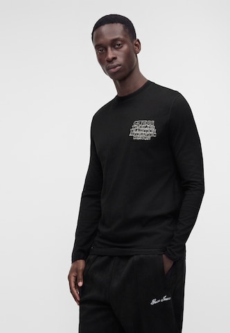 GUESS - Camiseta en negro: frente