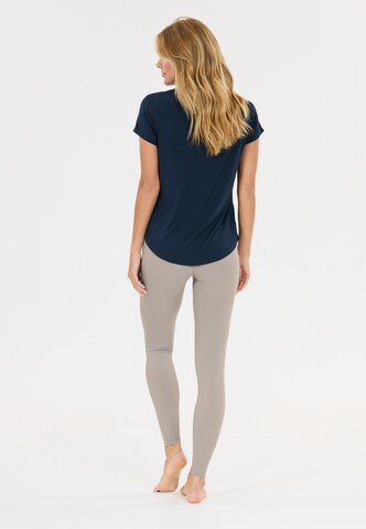 Athlecia Skinny Workout Pants 'Luxe' in Blue