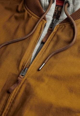 Superdry & Co Tussenjas 'Ma1' in Bruin
