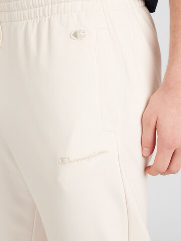 Tapered Pantaloni di Champion Authentic Athletic Apparel in bianco