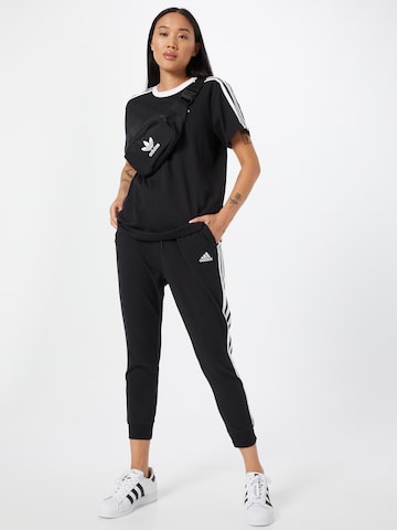 ADIDAS SPORTSWEAR - Camiseta funcional 'Essentials 3-Stripes' en negro