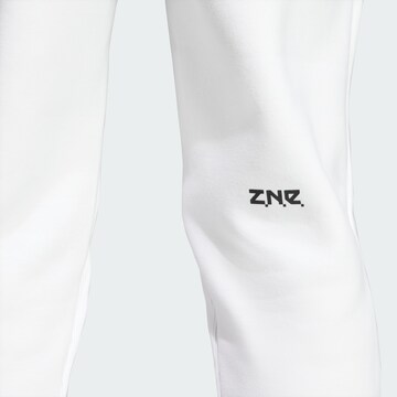 ADIDAS SPORTSWEAR Дънки Tapered Leg Спортен панталон 'Z.N.E. Premium' в бяло