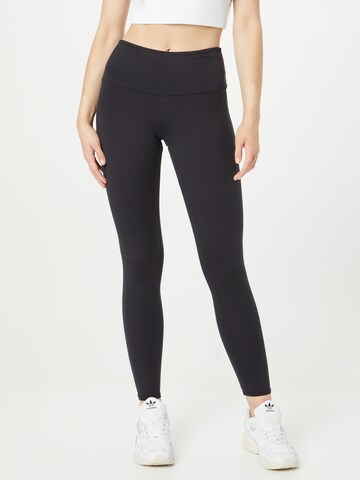 Onzie Skinny Workout Pants 'Eco Luxe' in Black: front