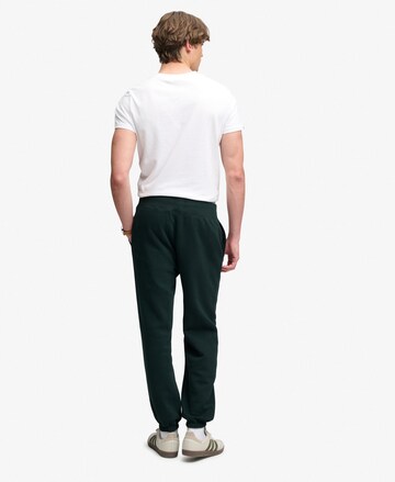 Superdry & Co Tapered Hose 'Essential' in Grün
