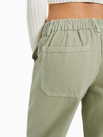 Bershka Zvonové kalhoty Džíny – zelená