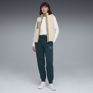 PUMA Tapered Sports trousers in Green