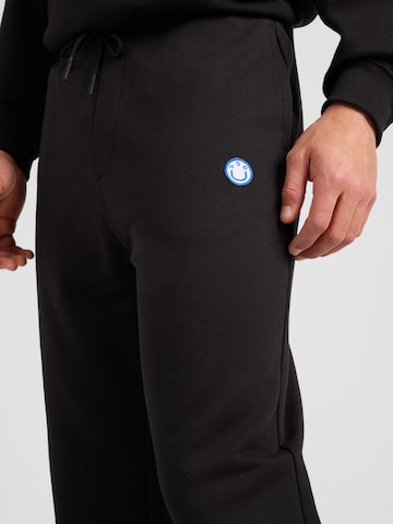 Tapered Pantaloni 'Nompio' di HUGO in nero