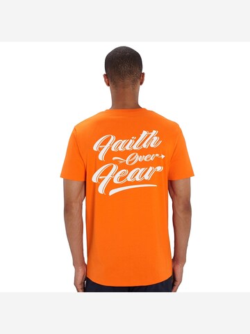 Rheinrebell Shirt 'T Shirt "Faith" Orange' in Orange
