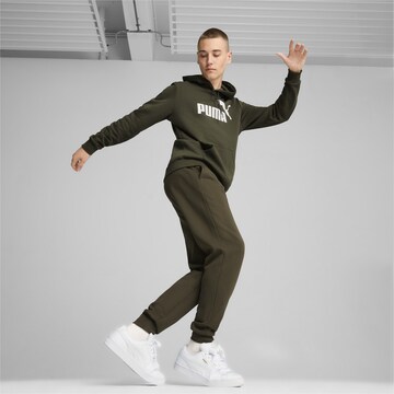 PUMA Спортен суитшърт 'Essentials' в зелено