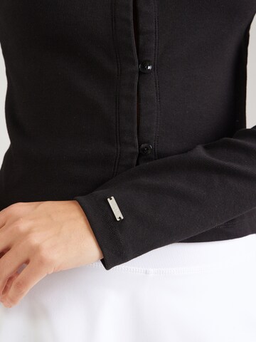 Cardigans de sport Aim'n en noir