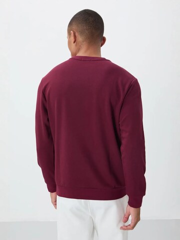 Sweat-shirt Tommy Life en rouge
