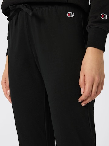 Champion Authentic Athletic Apparel Tapered Hosen in Schwarz