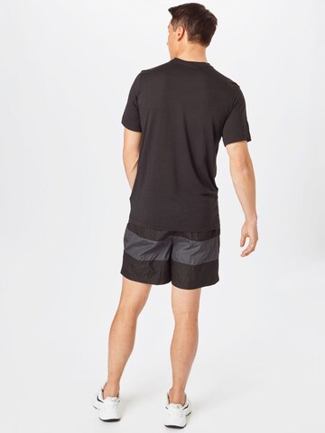 Nike Sportswear Широка кройка Панталон 'Air' в сиво