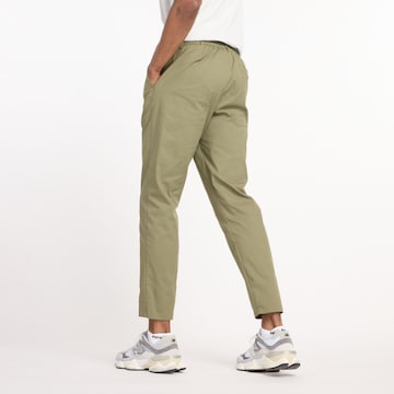 new balance Tapered Broek in Groen