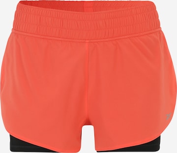 Reebok Workout Pants in Orange: front