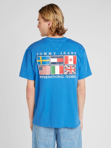 Tommy Jeans T-shirt 'ARCHIVE GAMES' i blå: framsida