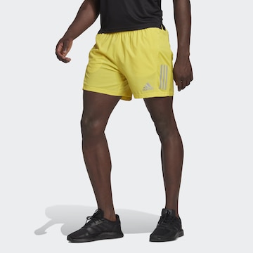 ADIDAS SPORTSWEAR Regular Workout Pants 'Own the Run' in Yellow: front