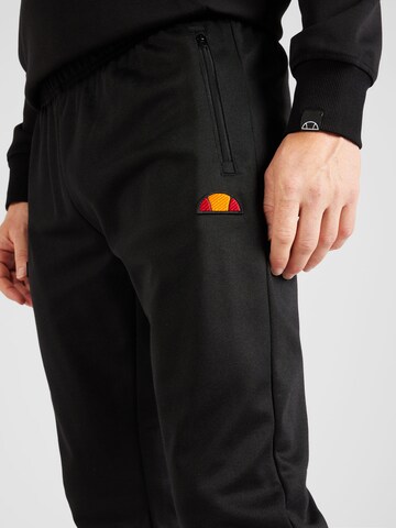 ELLESSE - Tapered Calças 'Bertoni' em preto