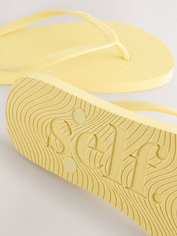 Tongs Next en jaune