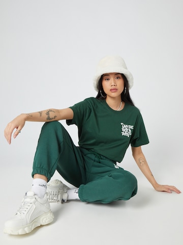 ABOUT YOU x Dardan Loose fit Pants 'Marlo' in Green