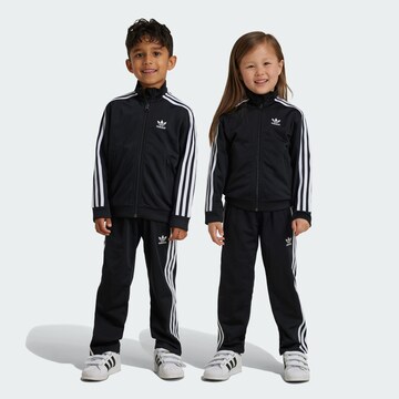 ADIDAS ORIGINALS - Ropa para correr 'Adicolor Firebird' en negro: frente