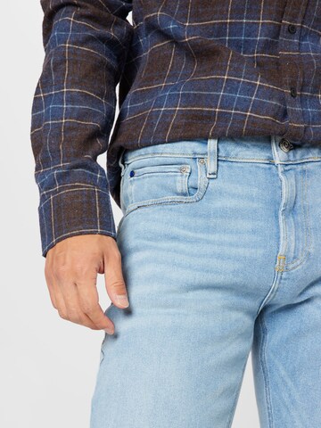 regular Jeans 'Seasonal Essentials Skim in organic cott' di SCOTCH & SODA in blu
